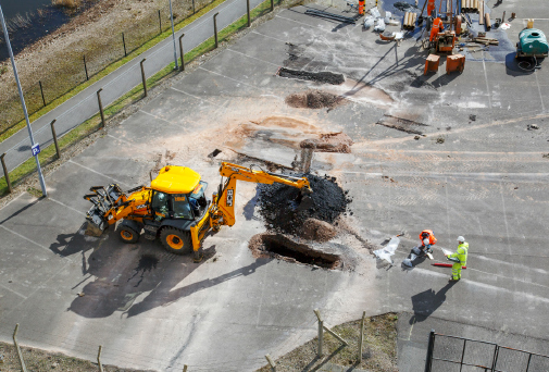 Pavers completing a commercial paving job.